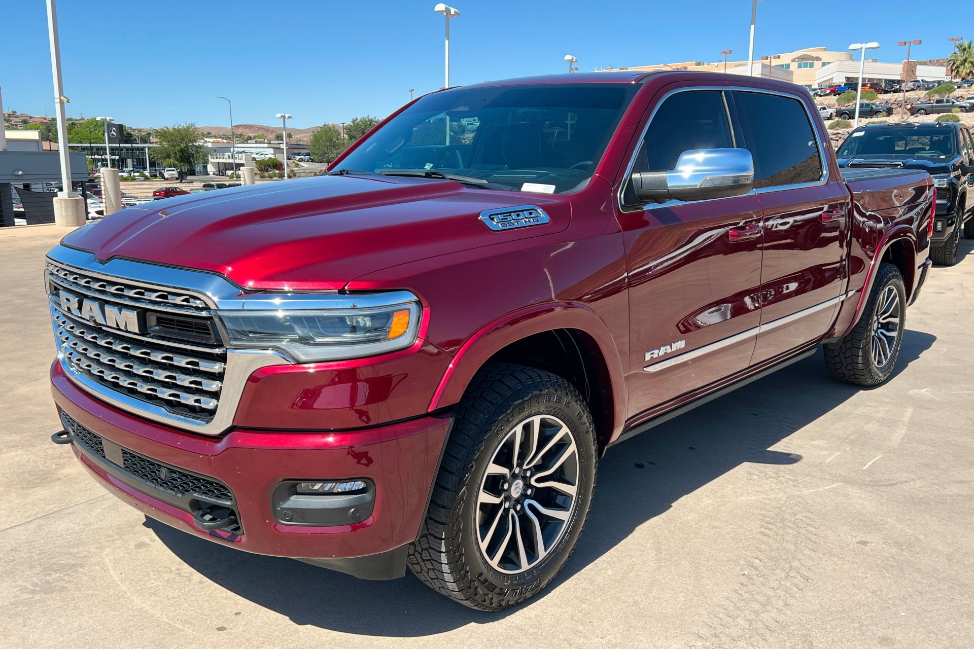 Used 2025 Delmonico Red Pearlcoat Ram Limited image 1