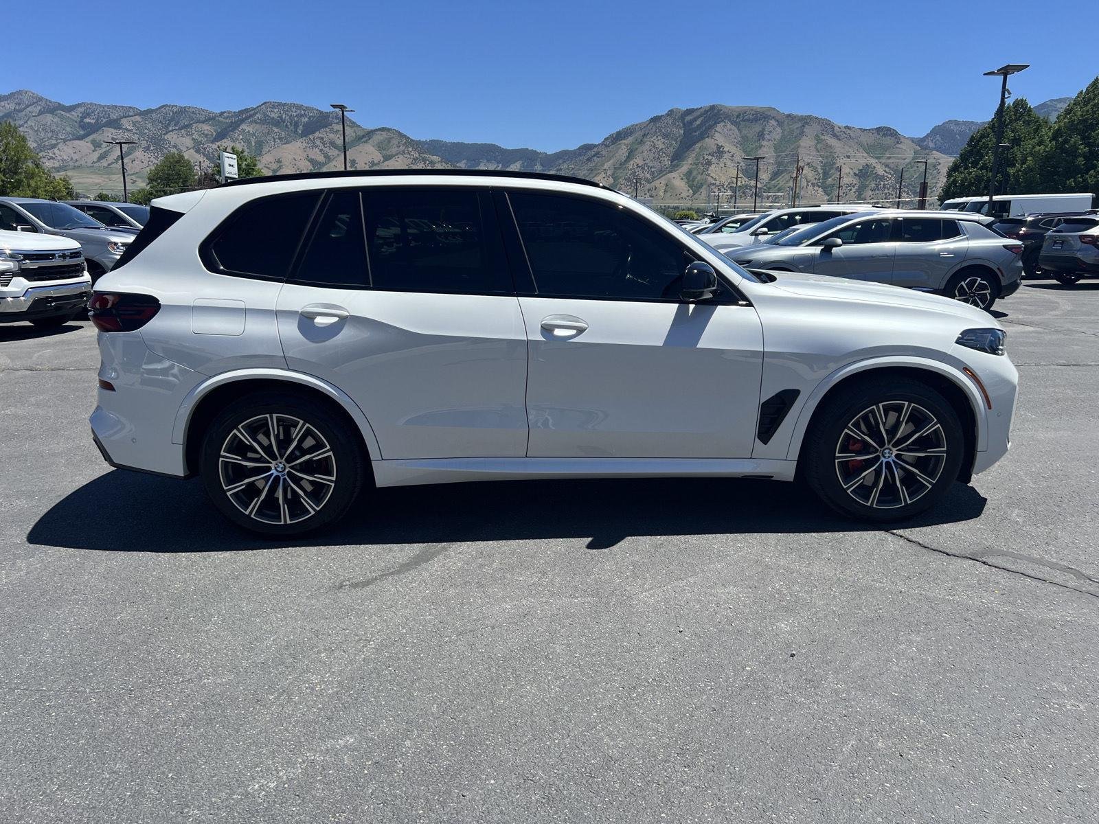 Used 2024 Mineral White Metallic BMW M60i image 6