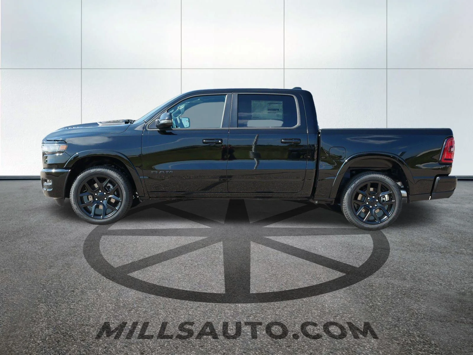 New 2026 Diamond Black Crystal Pearl-Coat Exterior Paint RAM Laramie image 2
