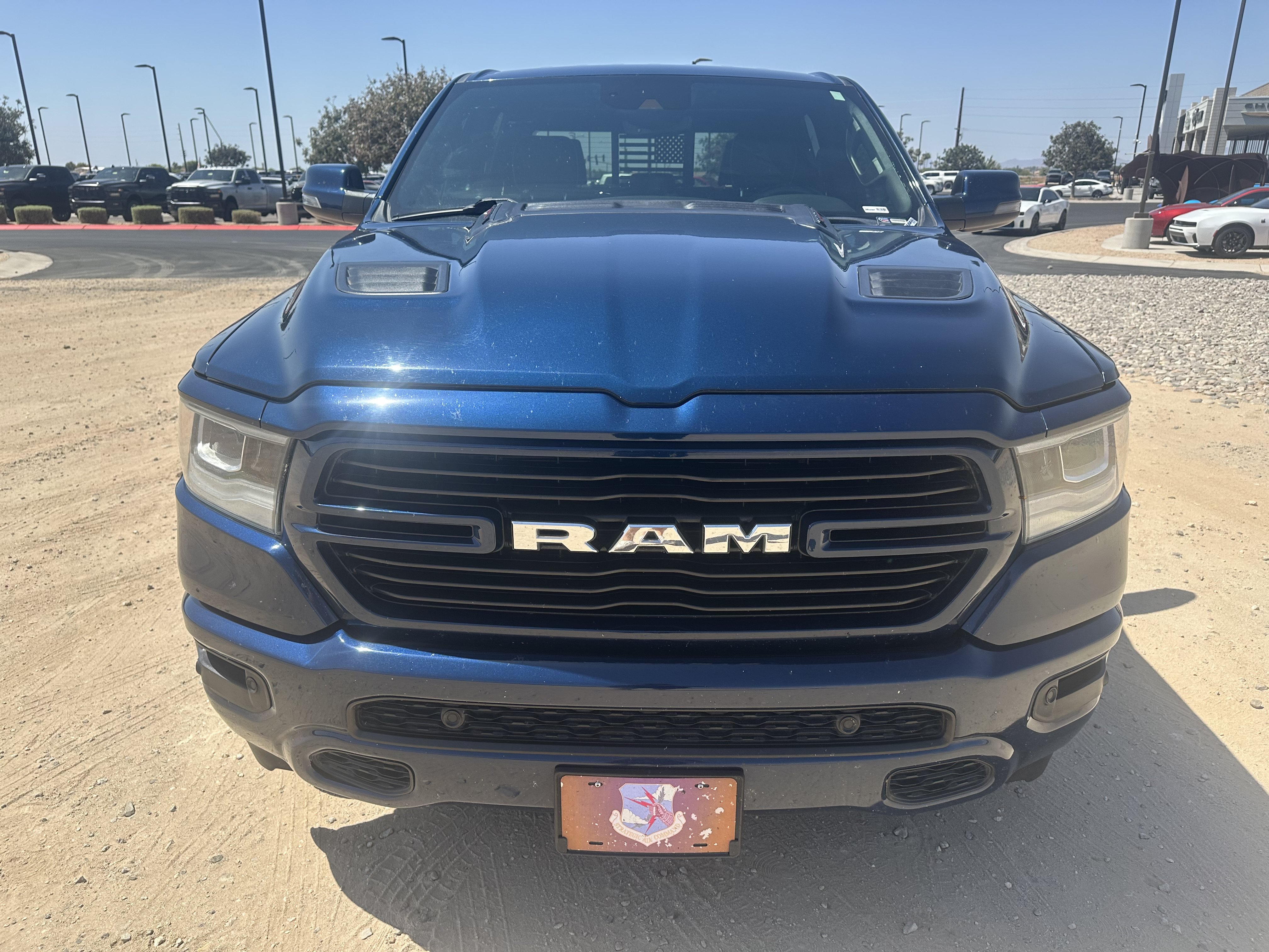 Used 2024 Patriot Blue Pearlcoat Ram Laramie image 8