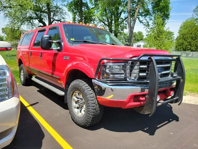 1999 Ford F-250 LARIAT 4X4 CREW CAB SWB's photo