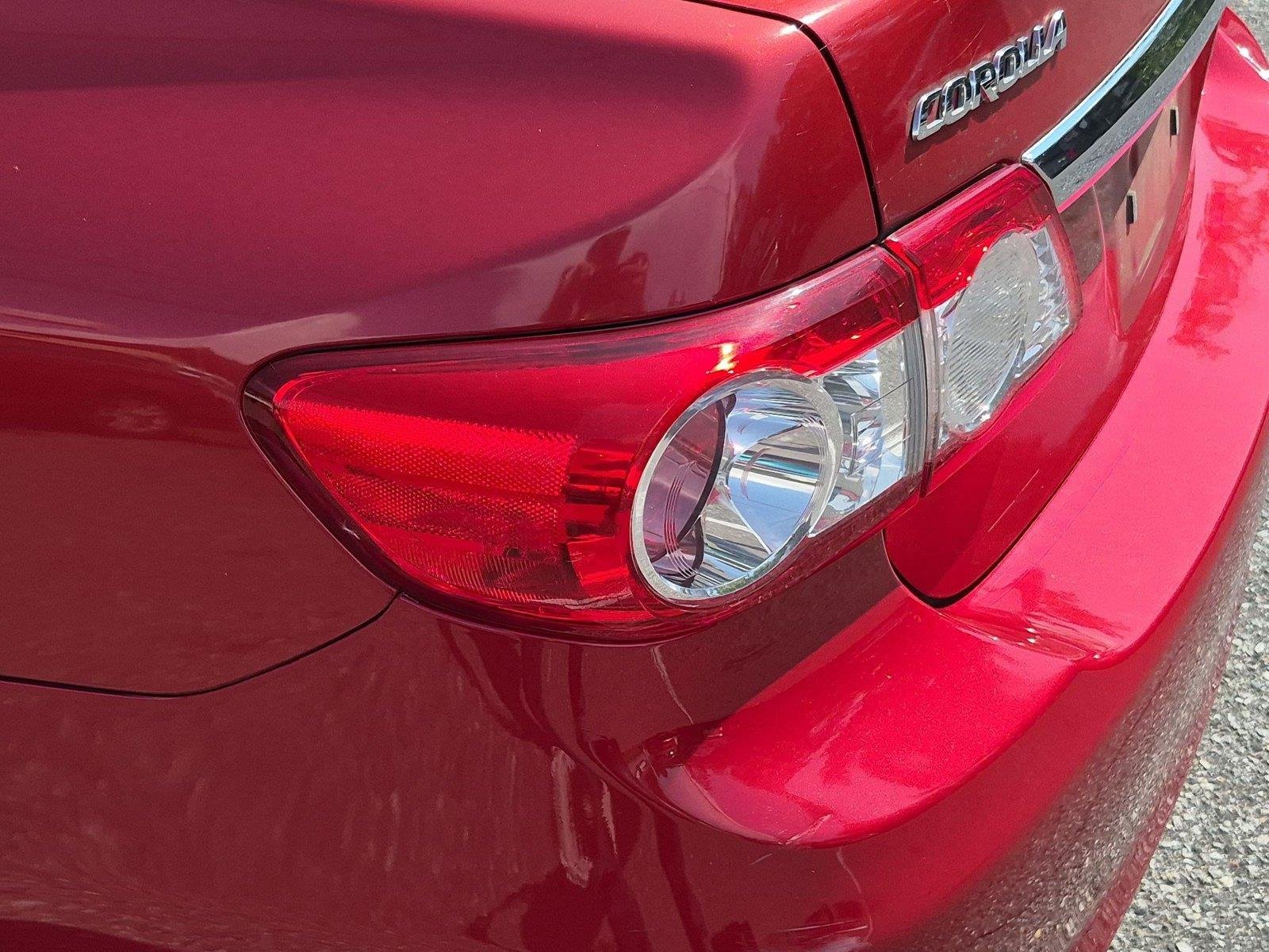 Used 2011 Barcelona Red Metallic Toyota LE image 11