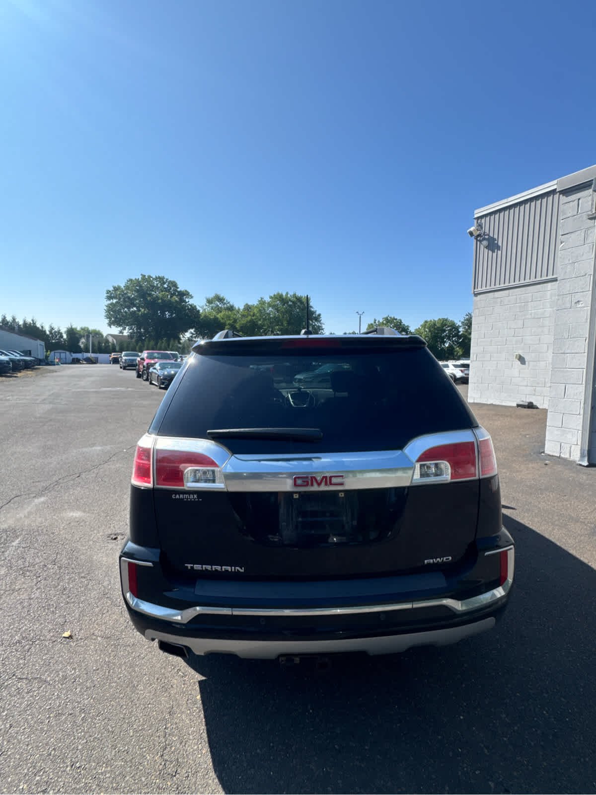 Used 2017 Ebony Twilight Metallic GMC Denali image 4
