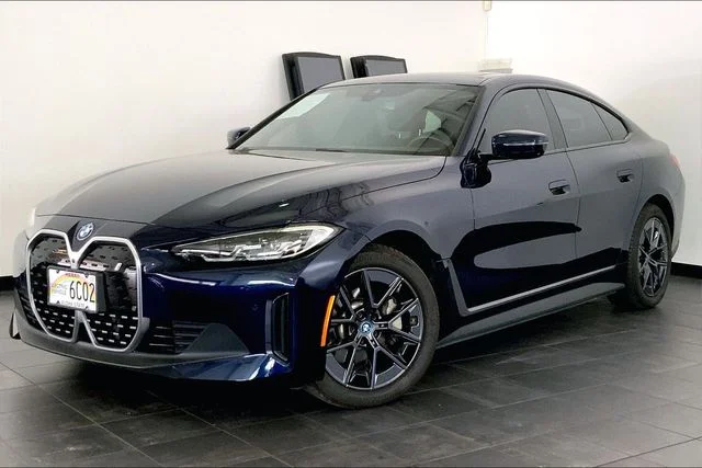Used 2023 Tanzanite Blue II Metallic BMW eDrive35 image 1