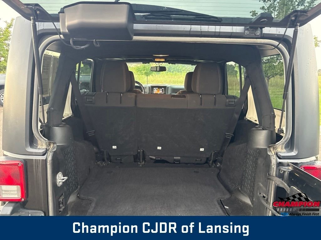 Used 2016 Black Jeep Unlimited Sahara image 14