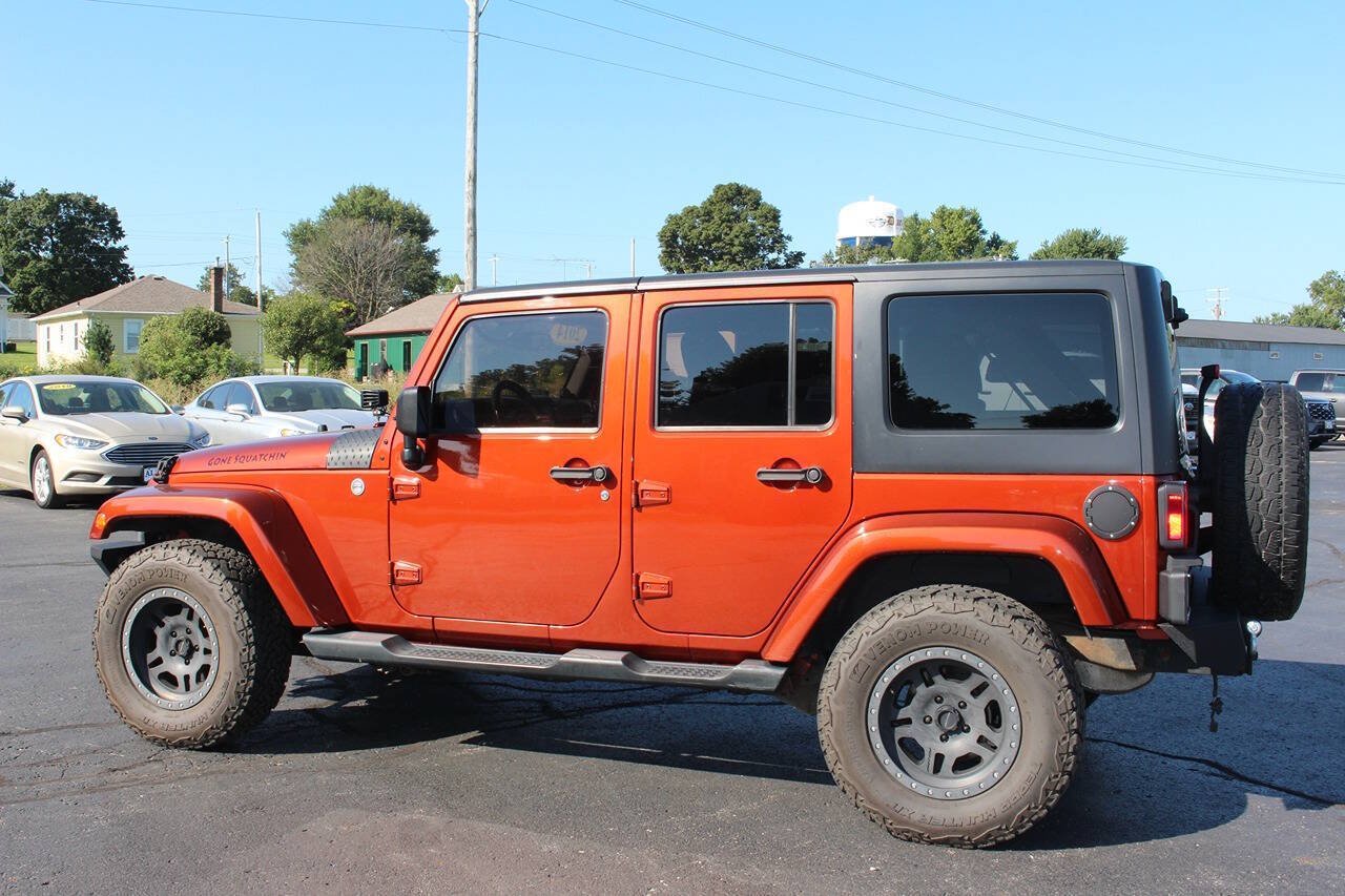 Used 2014 Copperhead Pearl Coat Jeep Sahara 4x4 4dr SUV image 2