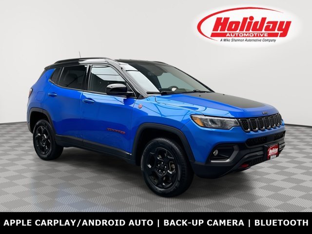 Used 2023 Laser Blue Pearlcoat Jeep Trailhawk image 1