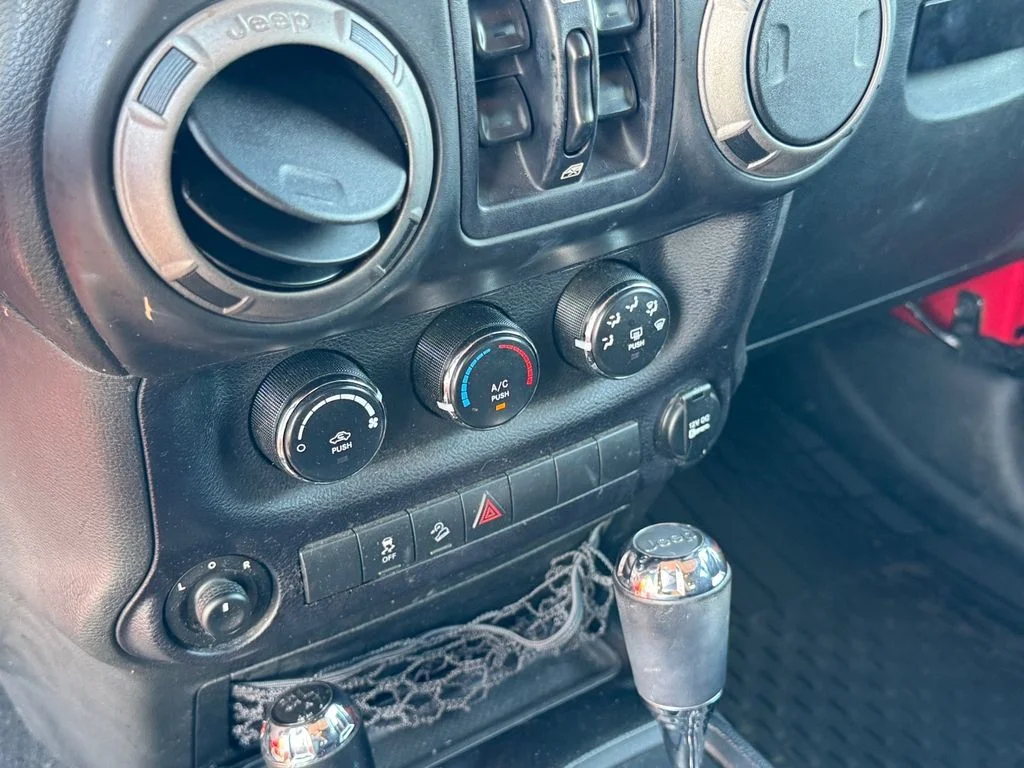 Used 2014 Red Jeep Unlimited Sport image 26