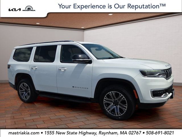 Used 2024 Bright White Clearcoat Jeep Series II image 1