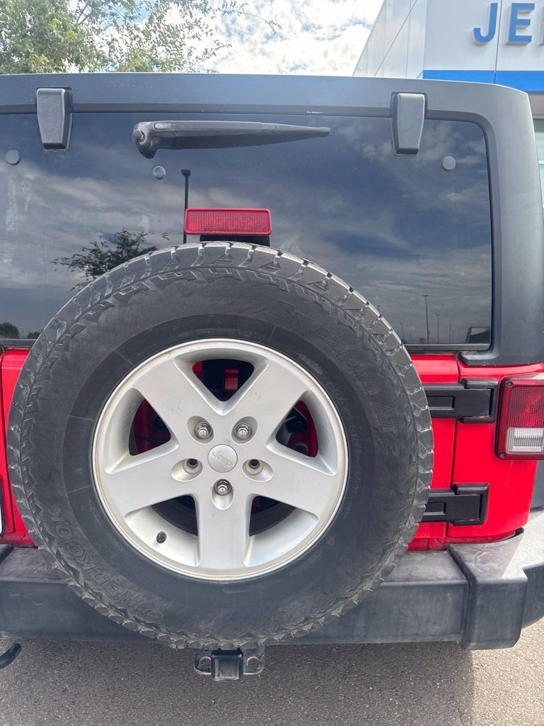 Used 2016 Firecracker Red Clearcoat Jeep Sport image 7