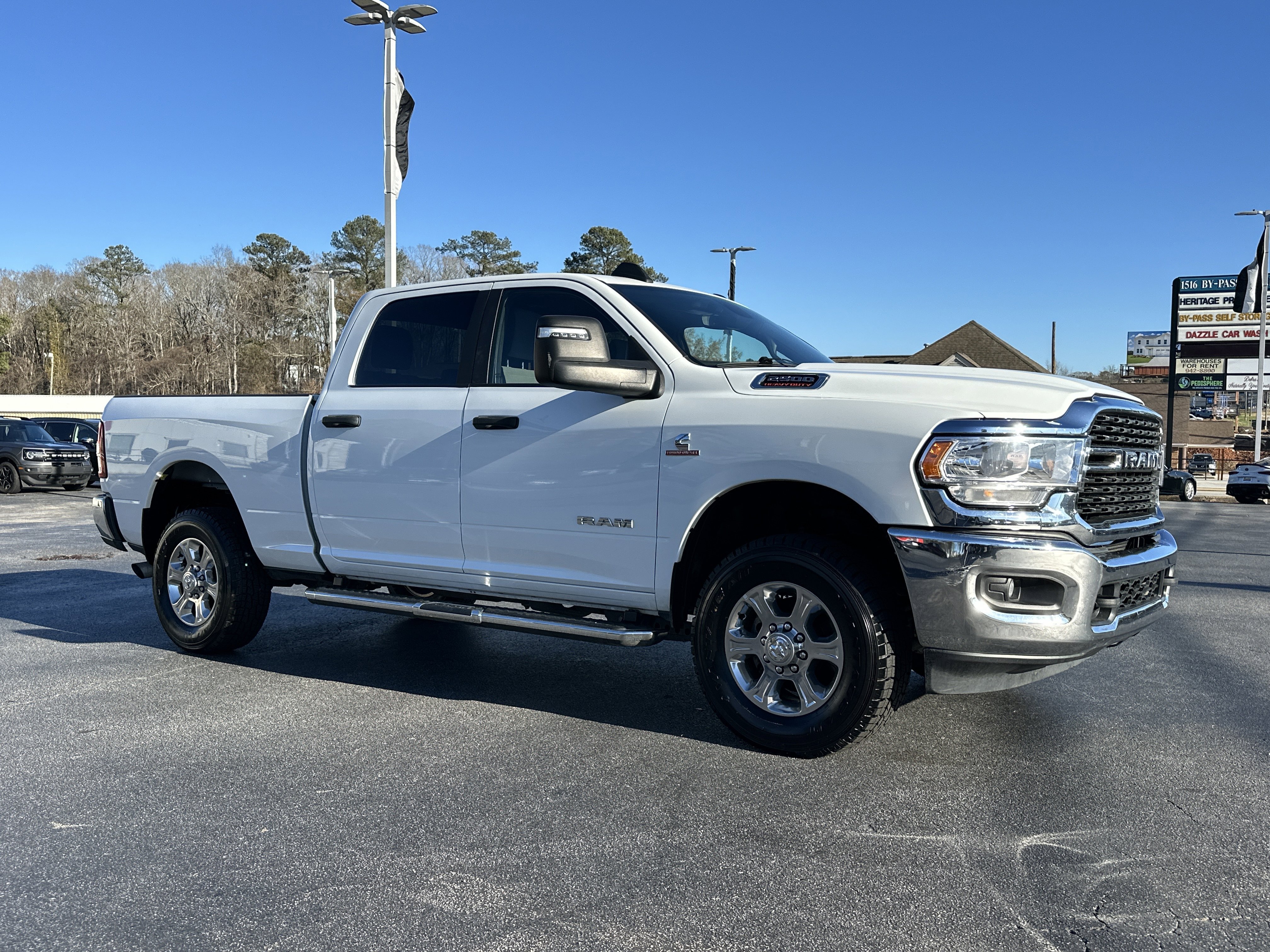 Used 2024 Bright White Clearcoat Ram Big Horn image 2