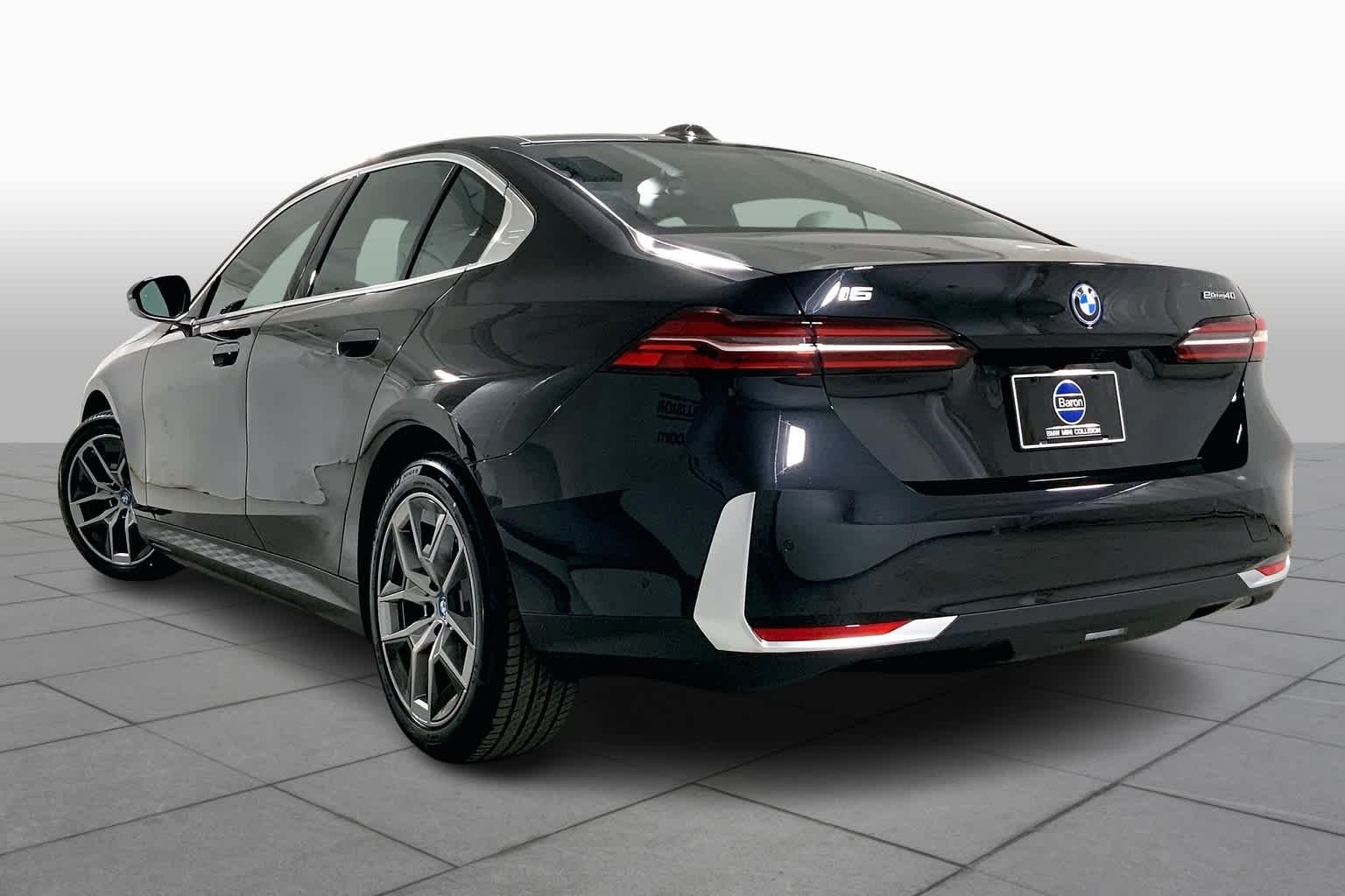 Used 2024 Black Sapphire Metallic BMW eDrive40 image 12