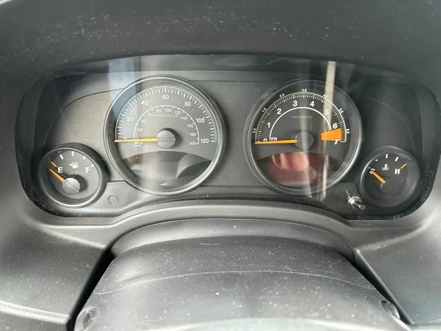 Used 2015 Granite Crystal Clearcoat Metallic Jeep Sport image 19