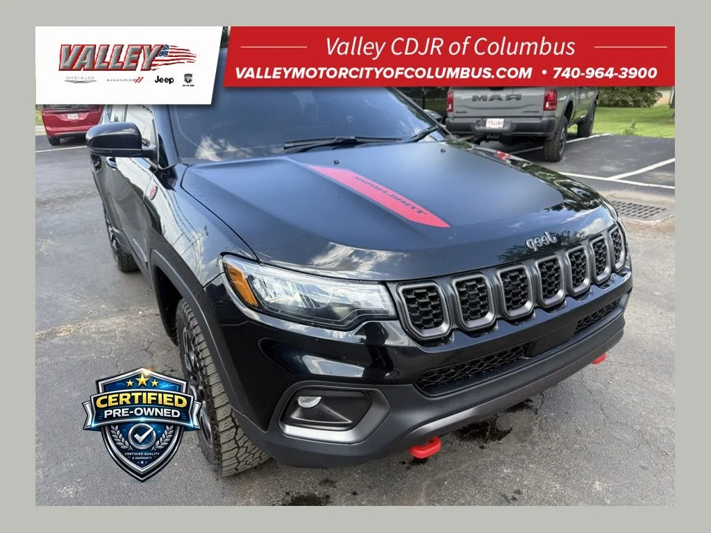 Certified Used 2024 Black Jeep Trailhawk image 1