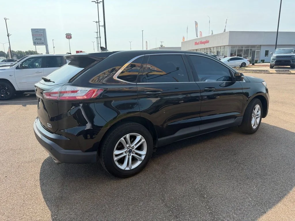 Used 2019 Agate Black Metallic Ford SEL image 5