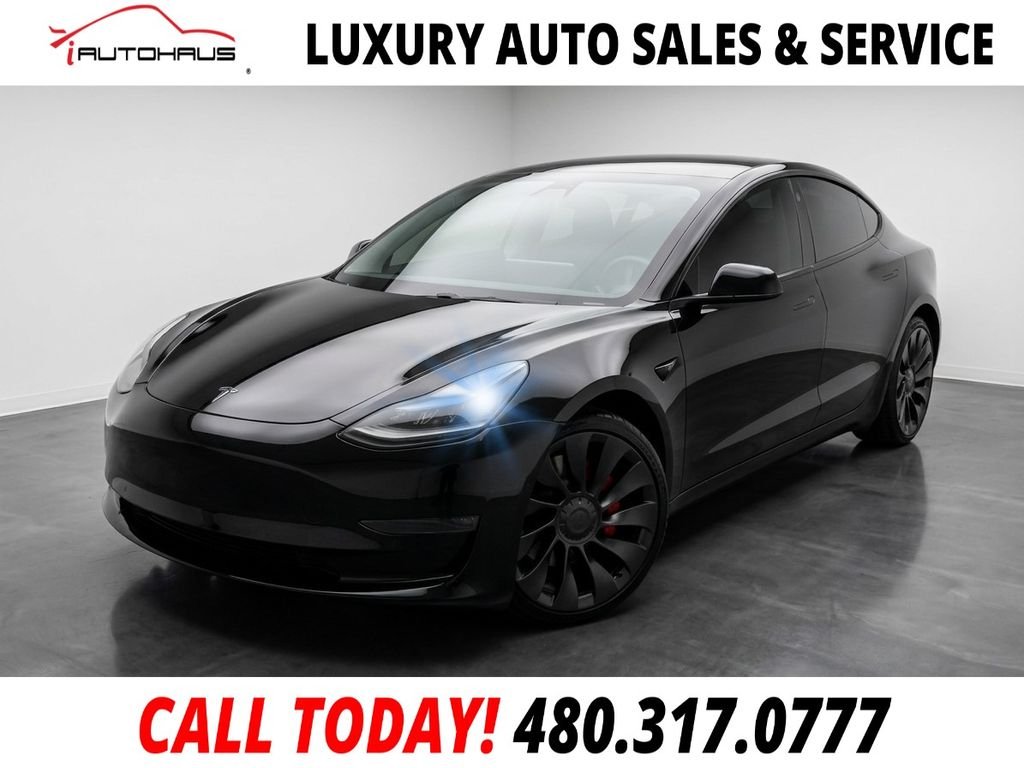 Used 2023 Black Tesla Performance image 1