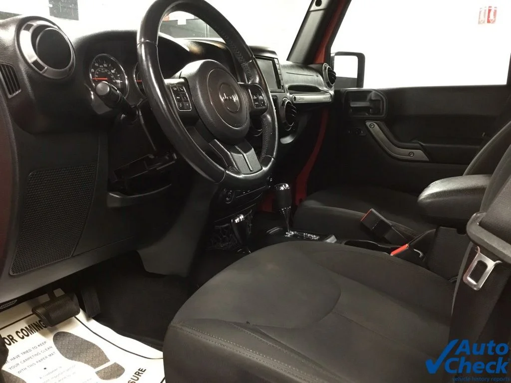 Used 2015 Orange Jeep Unlimited Sport image 25