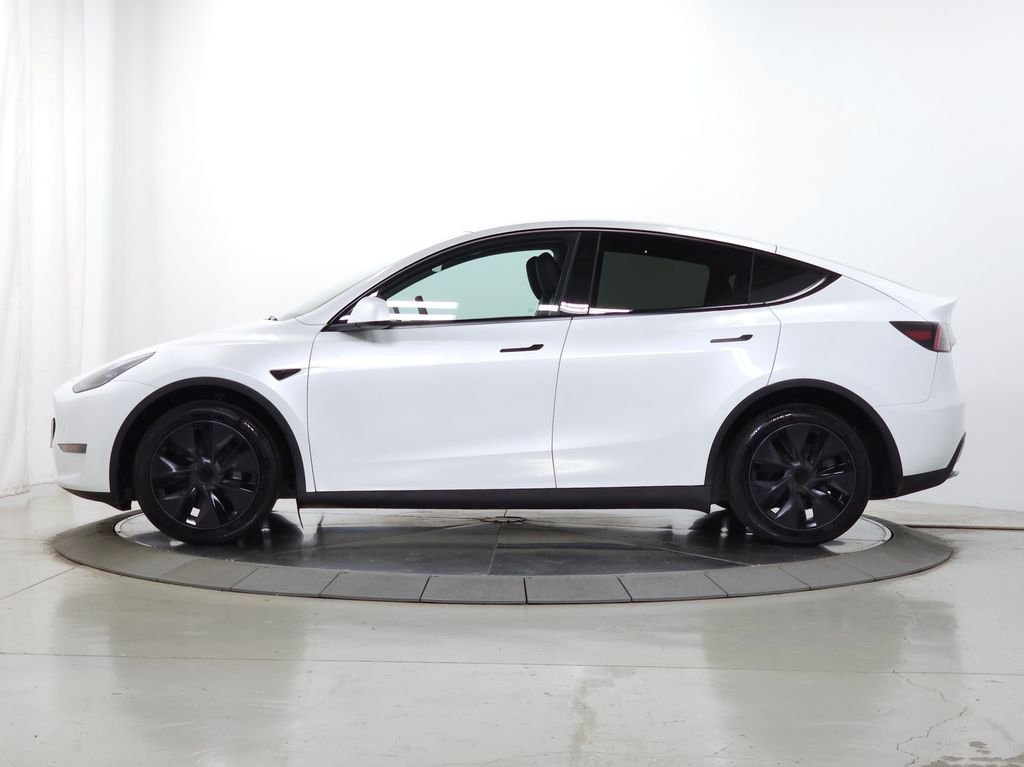 Used 2025 Tesla Model Y Long Range with VIN 7SAYGDEE7SF290545 for sale in Naperville, IL