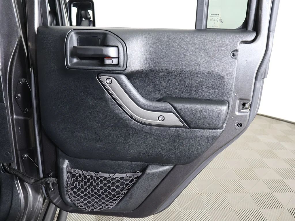 Used 2018 Granite Crystal Metallic Clearcoat Jeep Unlimited Sport image 19