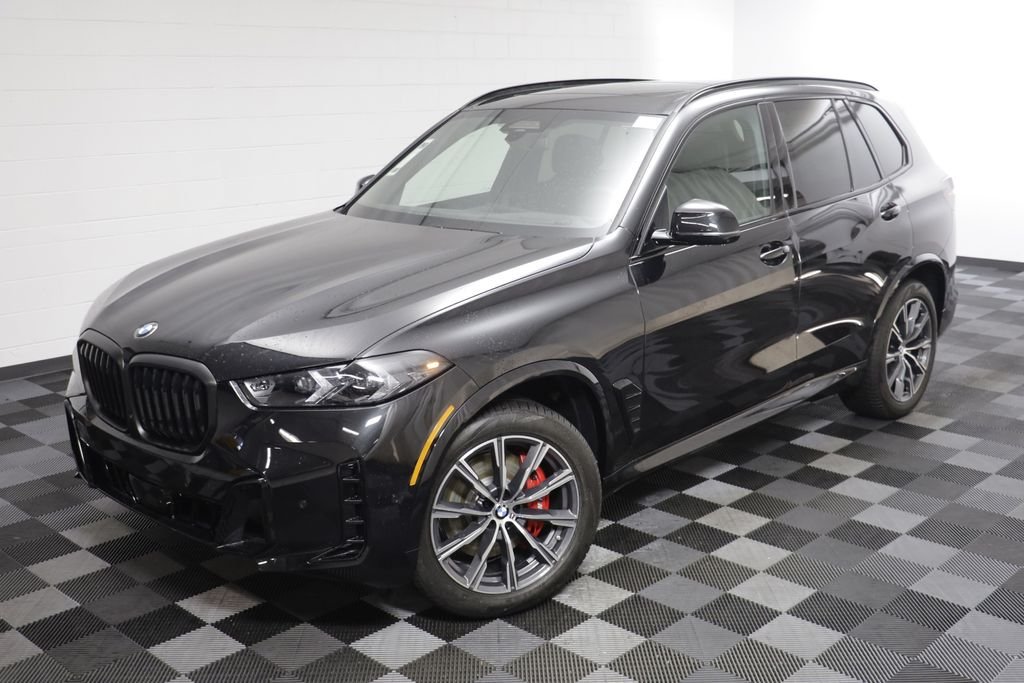 New 2026 Black Sapphire Metallic BMW xDrive40i image 2
