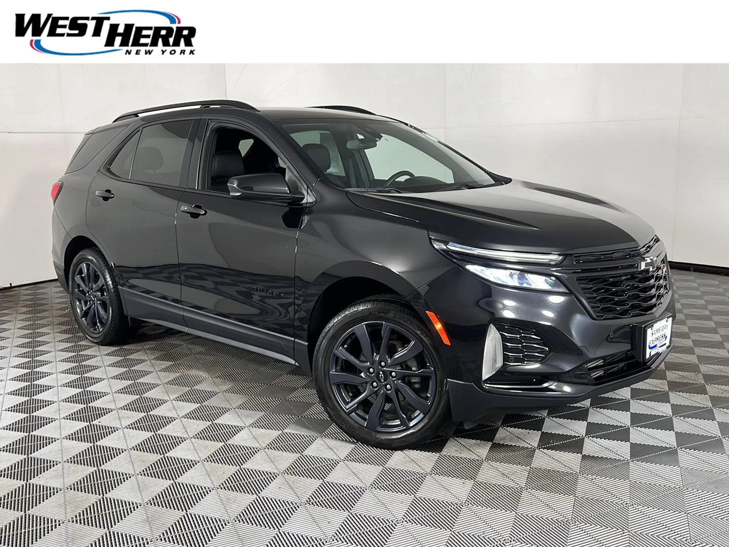 Used 2024 Mosaic Black Metallic Chevrolet RS image 1