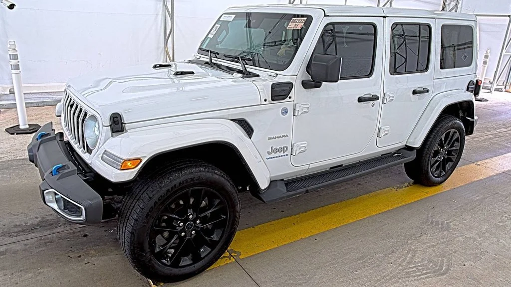 Used 2024 White Jeep Sahara 4xe image 1