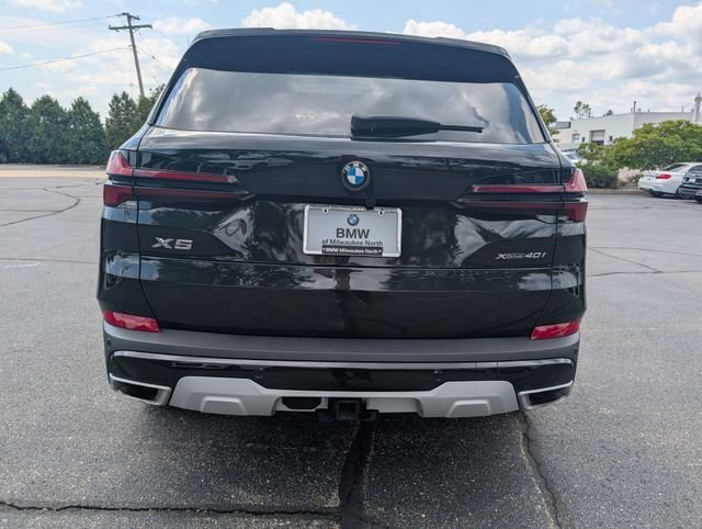 Certified Used 2024 Black Sapphire Metallic BMW xDrive40i image 4