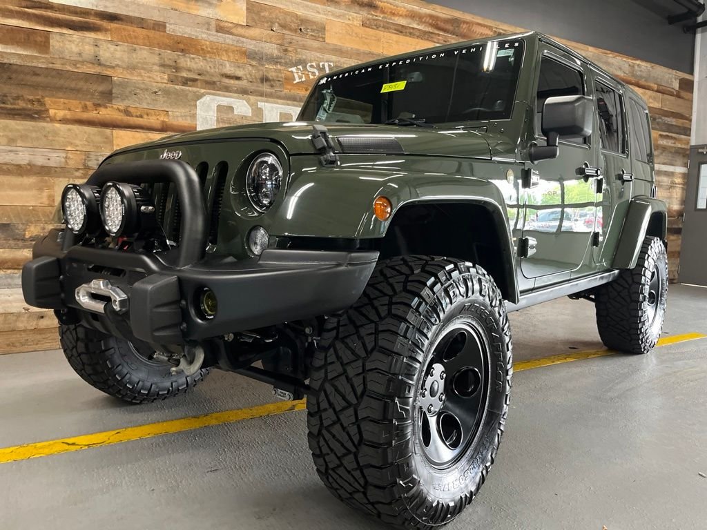 Used 2014 Black Clearcoat Jeep Unlimited Rubicon image 14