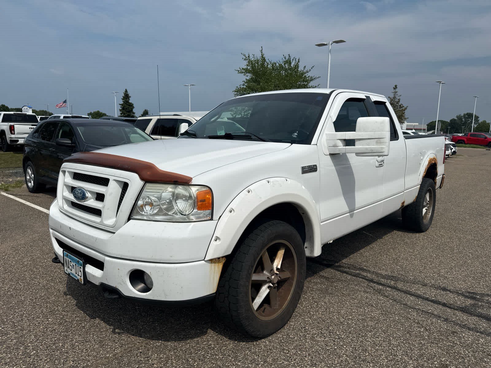 Used 2008 Ford F-150 XLT with VIN 1FTPX14V38FB03606 for sale in Brooklyn Center, MN