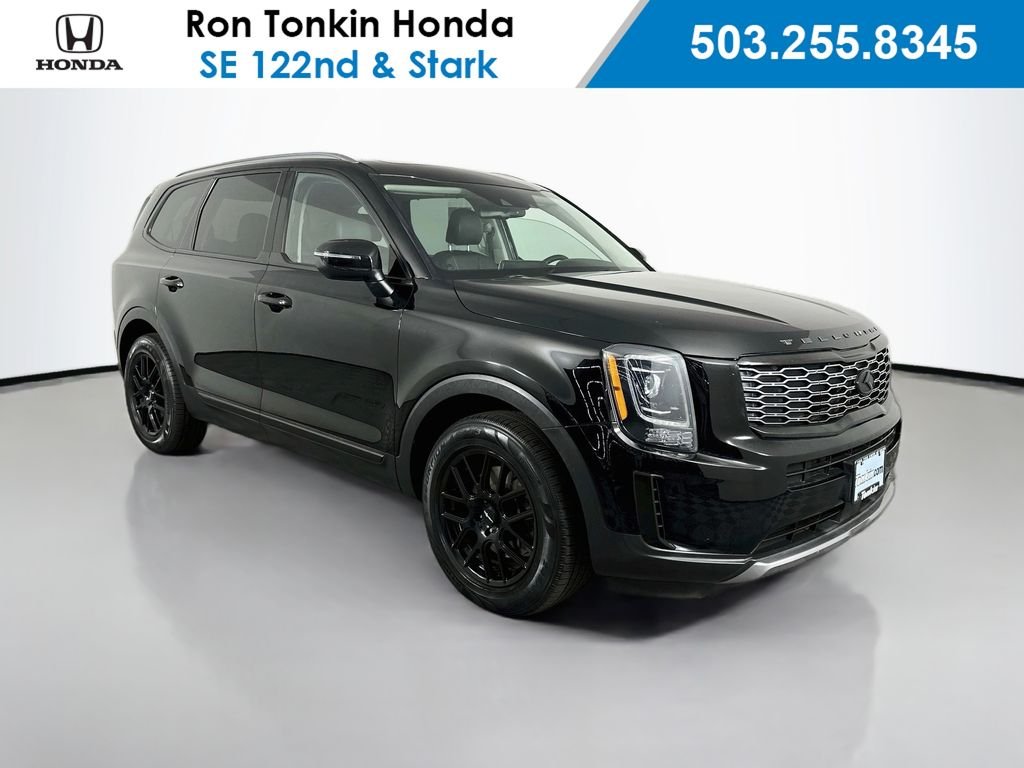 Used 2020 Ebony Black Kia EX image 1