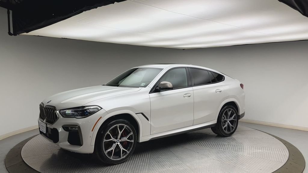 Used 2021 White Metallic BMW M50i image 6