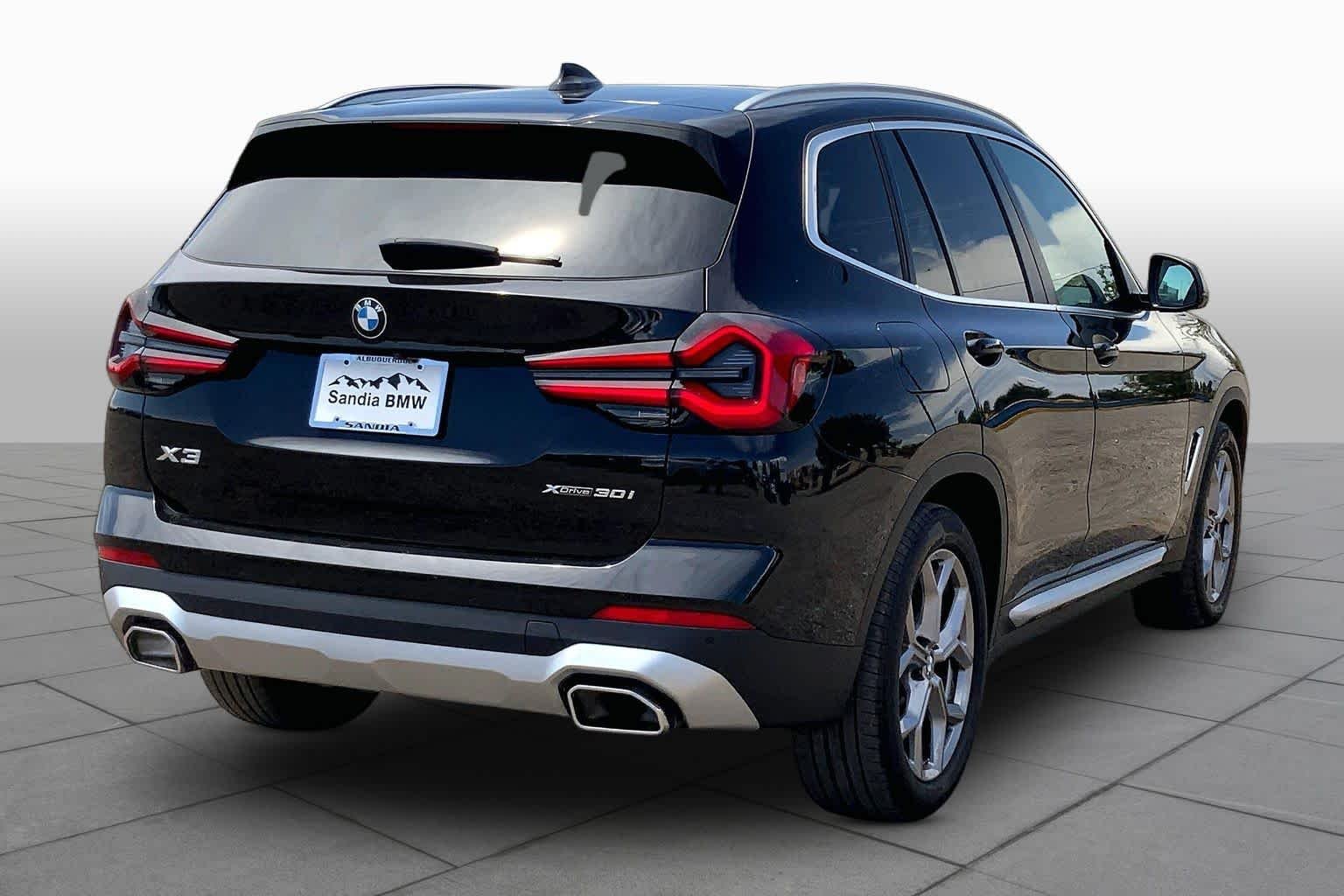 Used 2023 Black Sapphire Metallic BMW xDrive30i image 11