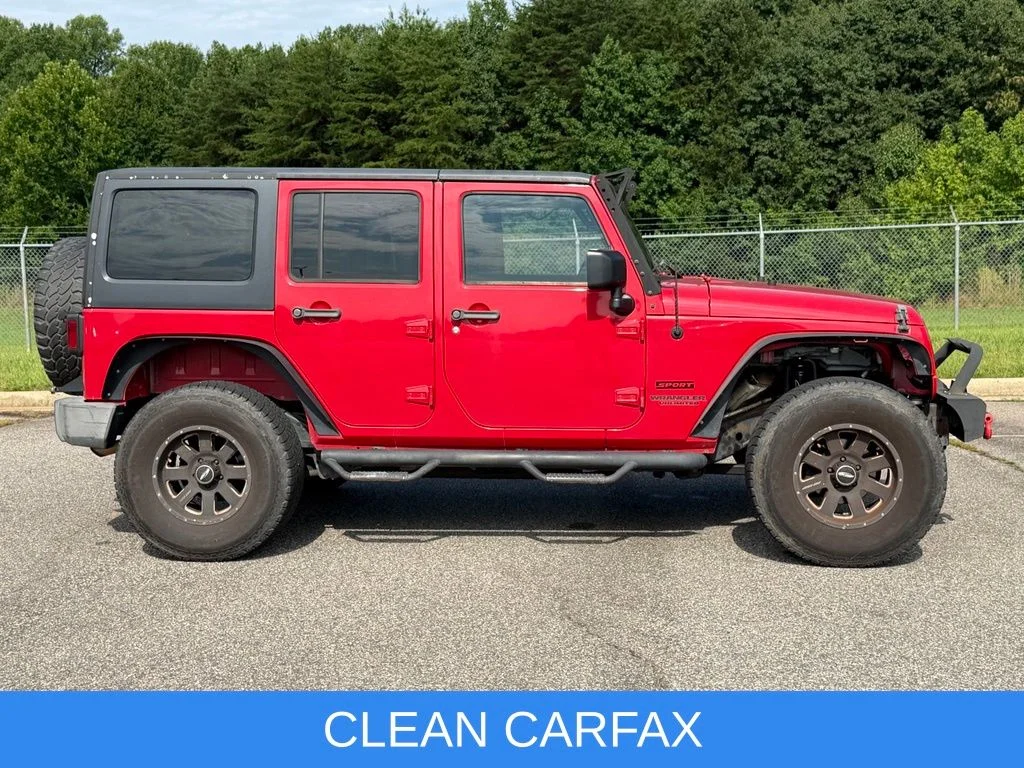 Used 2014 Red Jeep Unlimited Sport image 3