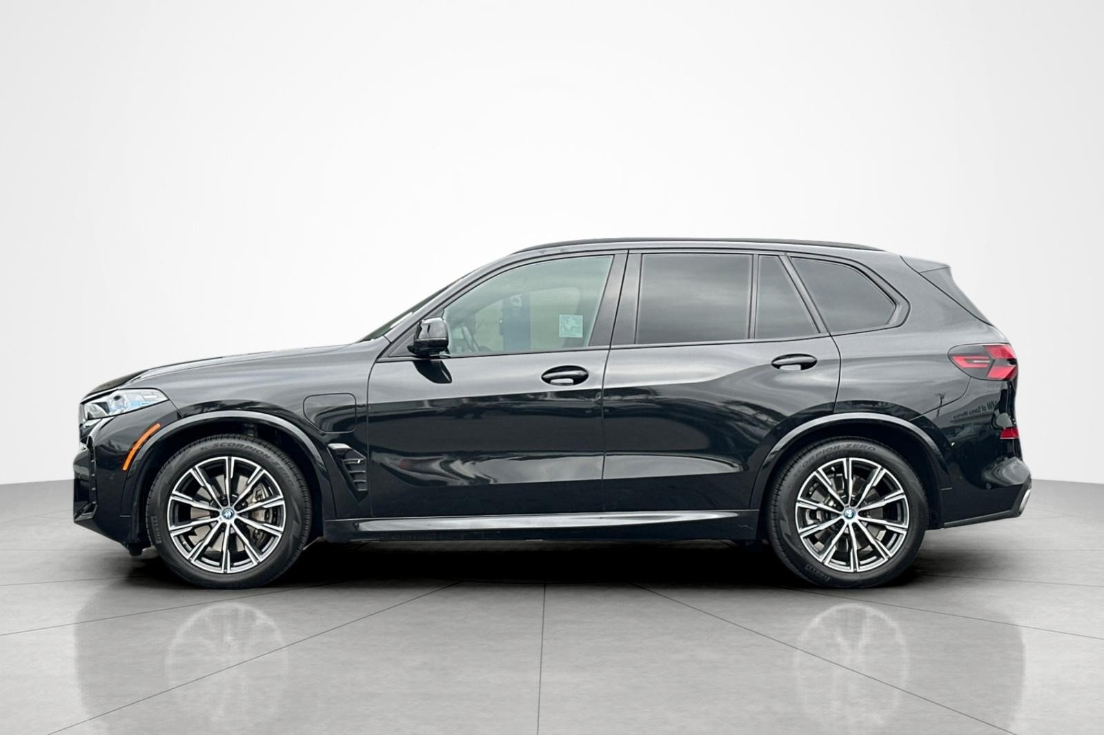 Used 2024 Black Sapphire Metallic BMW xDrive50e image 2