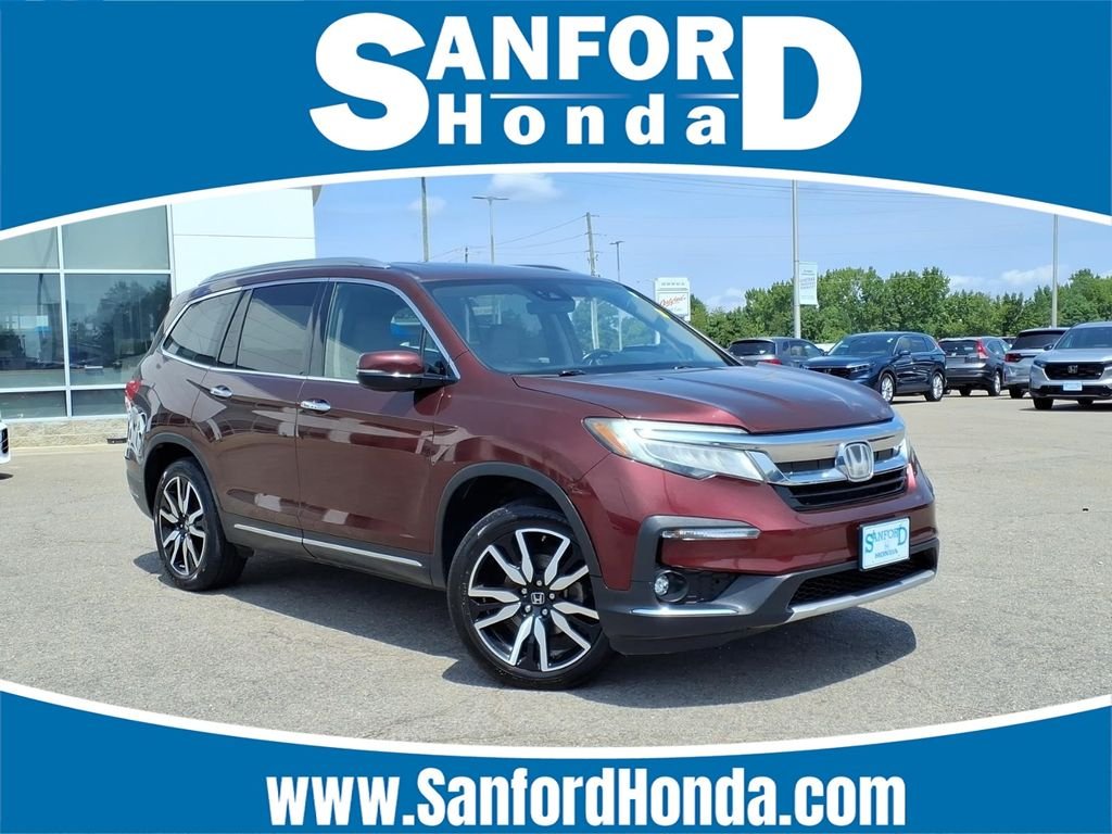 Used 2019 Deep Scarlet Pearl Honda Elite image 1