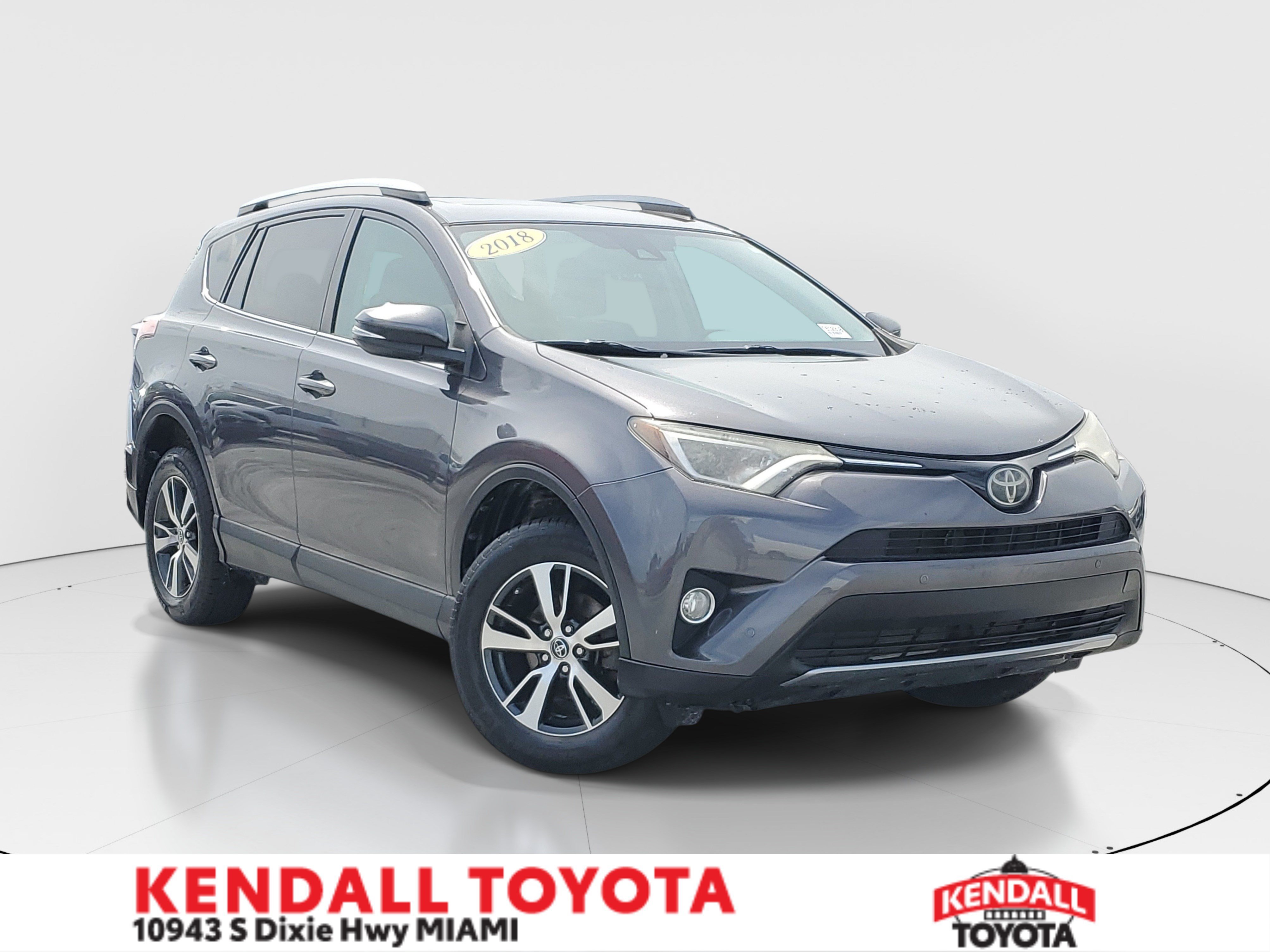 Used 2018 Magnetic Gray Metallic Toyota XLE image 1