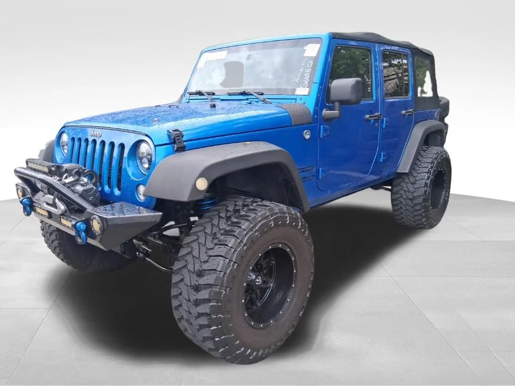 Used 2015 Blue Jeep Unlimited Sport image 10