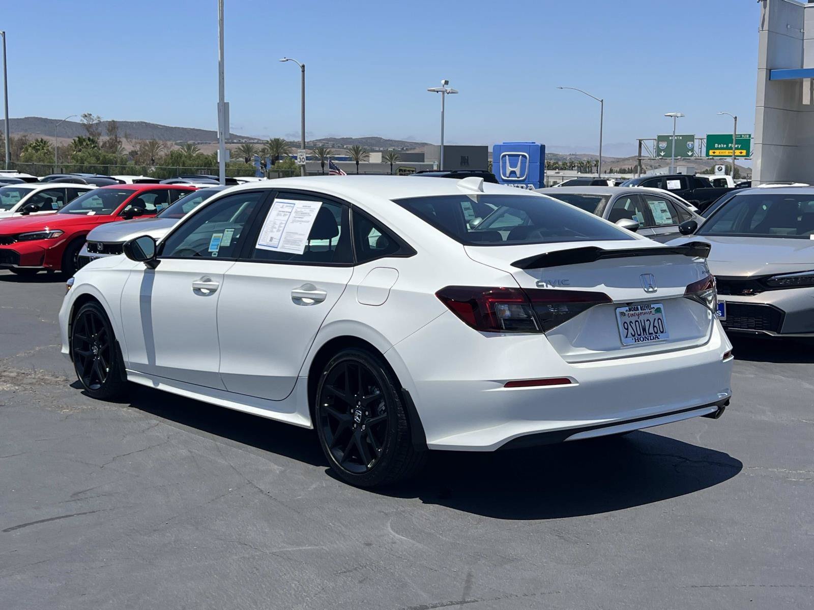 Certified Used 2025 Platinum White Pearl Honda Sport image 3