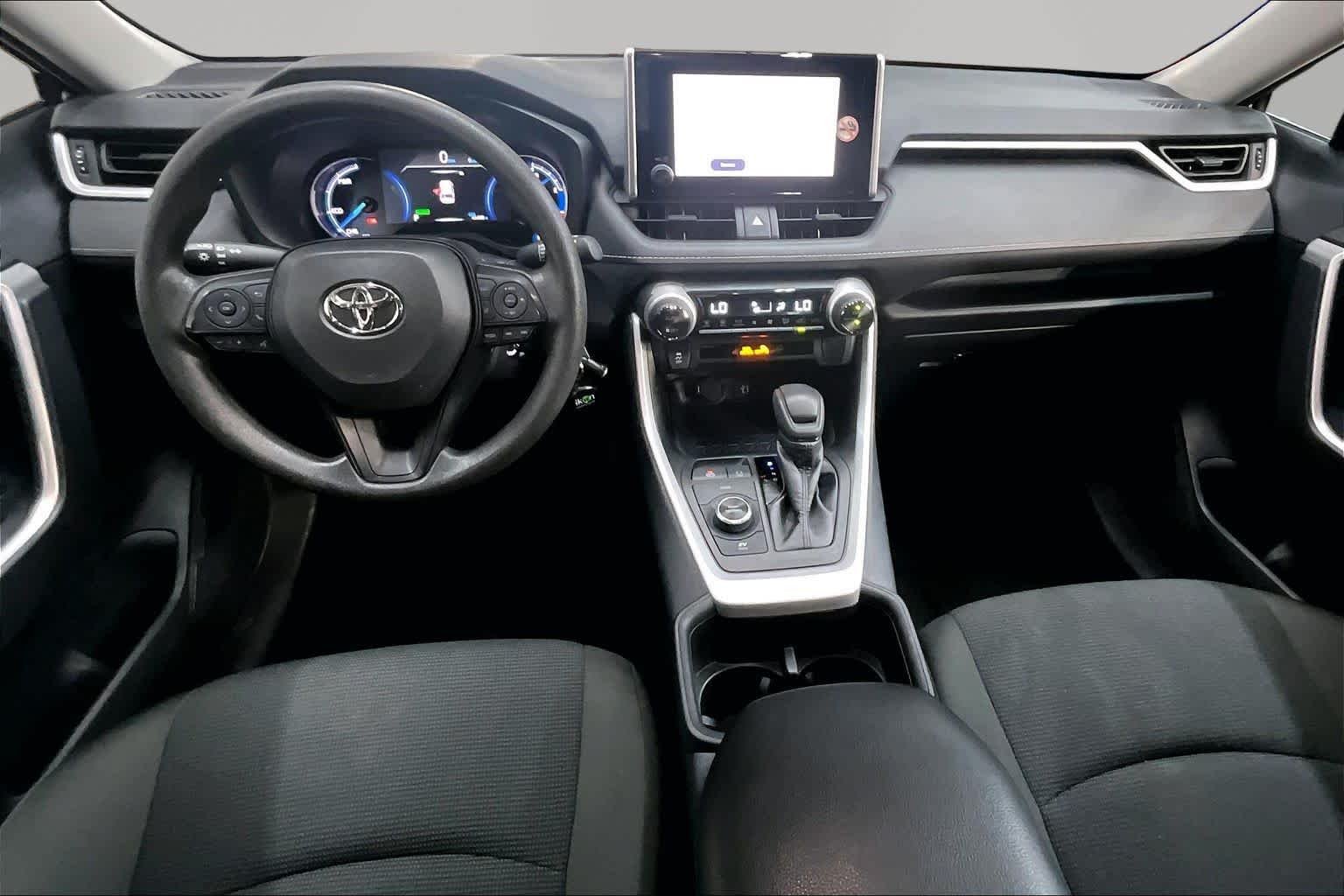 Used 2025 Midnight Black Metallic Toyota Hybrid LE image 16