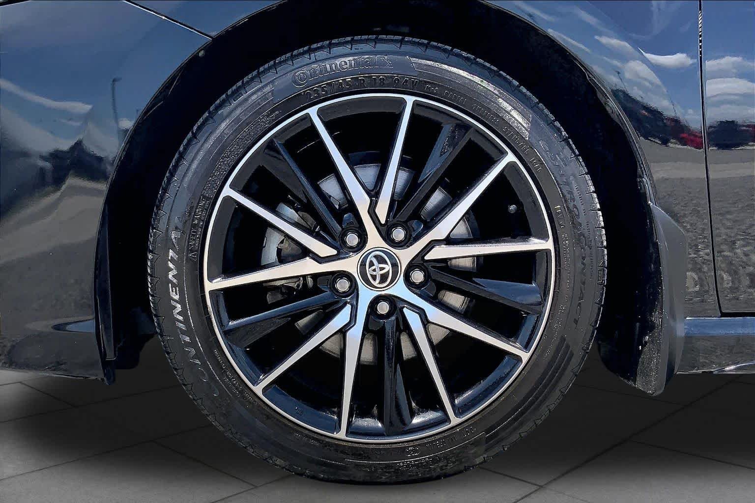 Used 2023 Midnight Black Metallic Toyota SE image 11