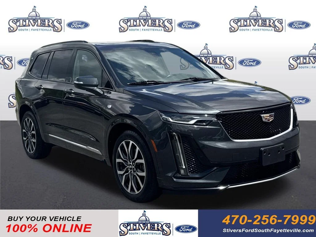 Used 2021 Green Cadillac Sport image 1
