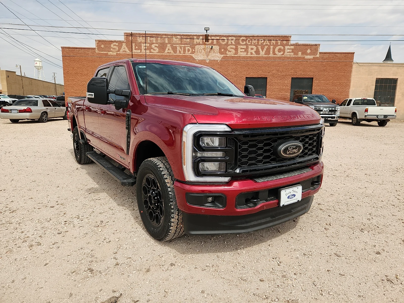 New 2026 Ruby Red Metallic Tinted Clearcoat Ford F-250® Lariat® image 1