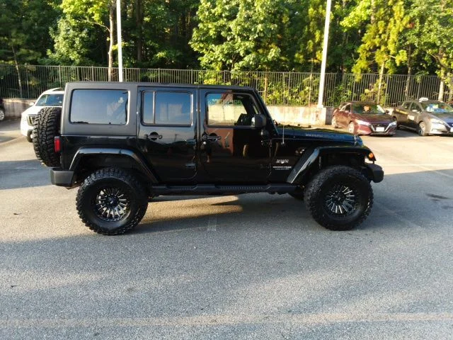 Used 2018 Black Jeep Unlimited Sahara image 7