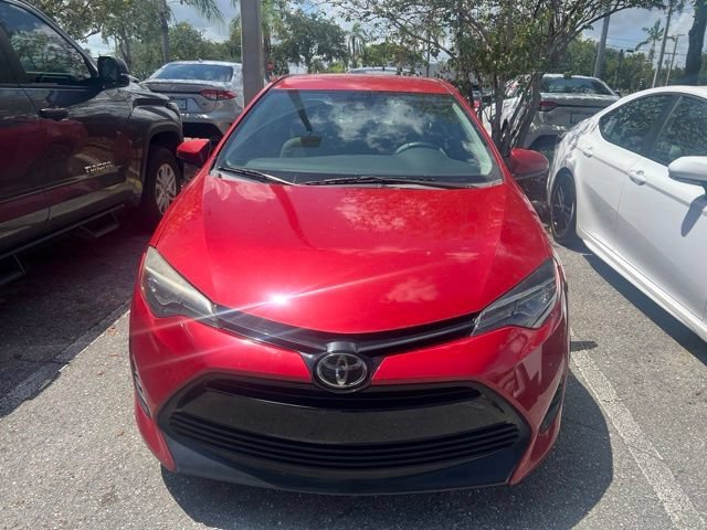 Used 2018 Barcelona Red Metallic Toyota LE image 8