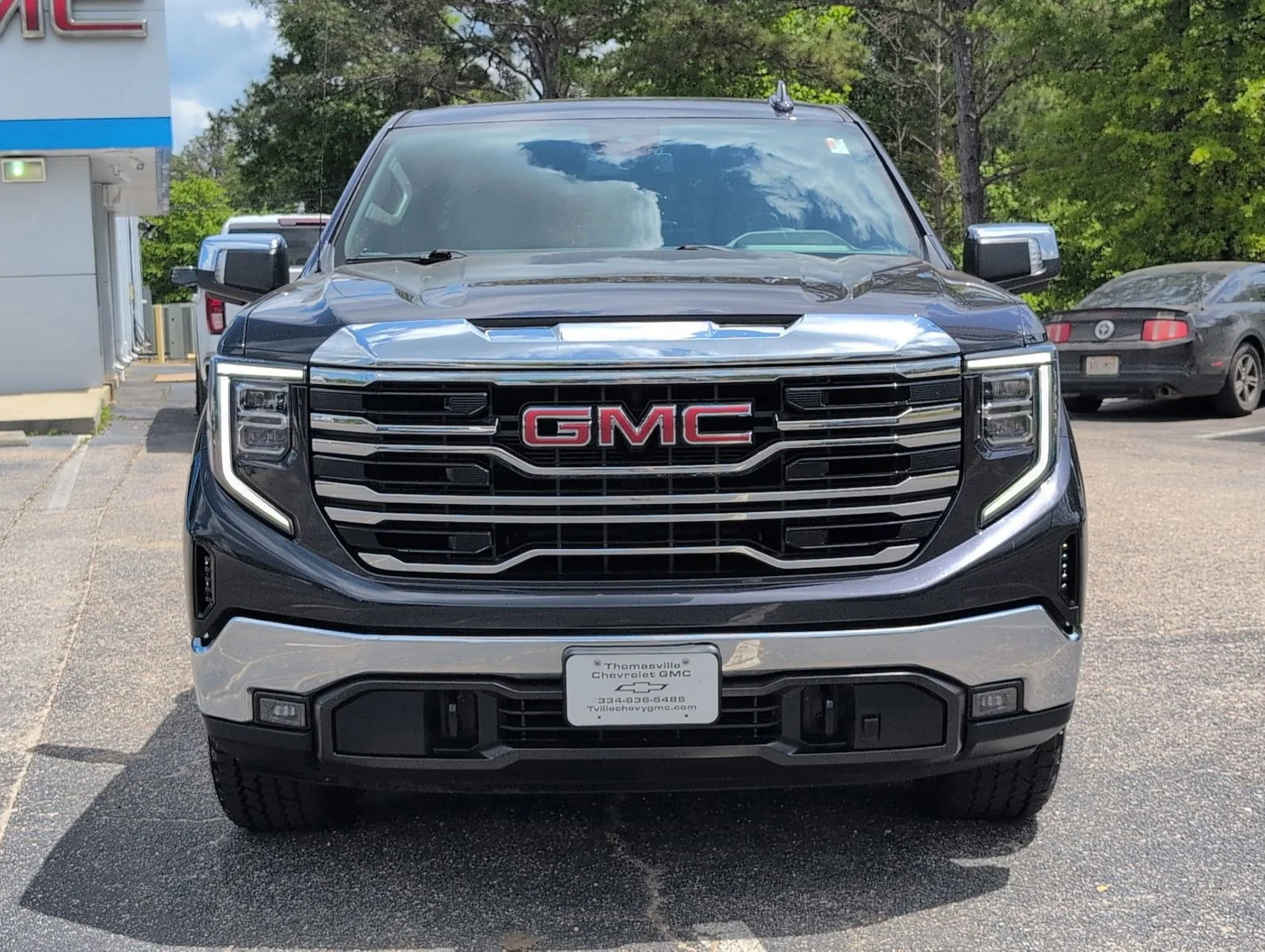 Used 2023 Titanium Rush Metallic GMC SLT image 9