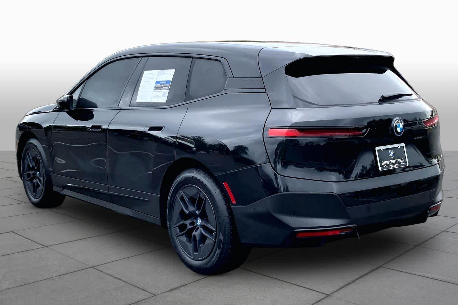 Used 2024 Black Sapphire Metallic BMW xDrive50 image 10