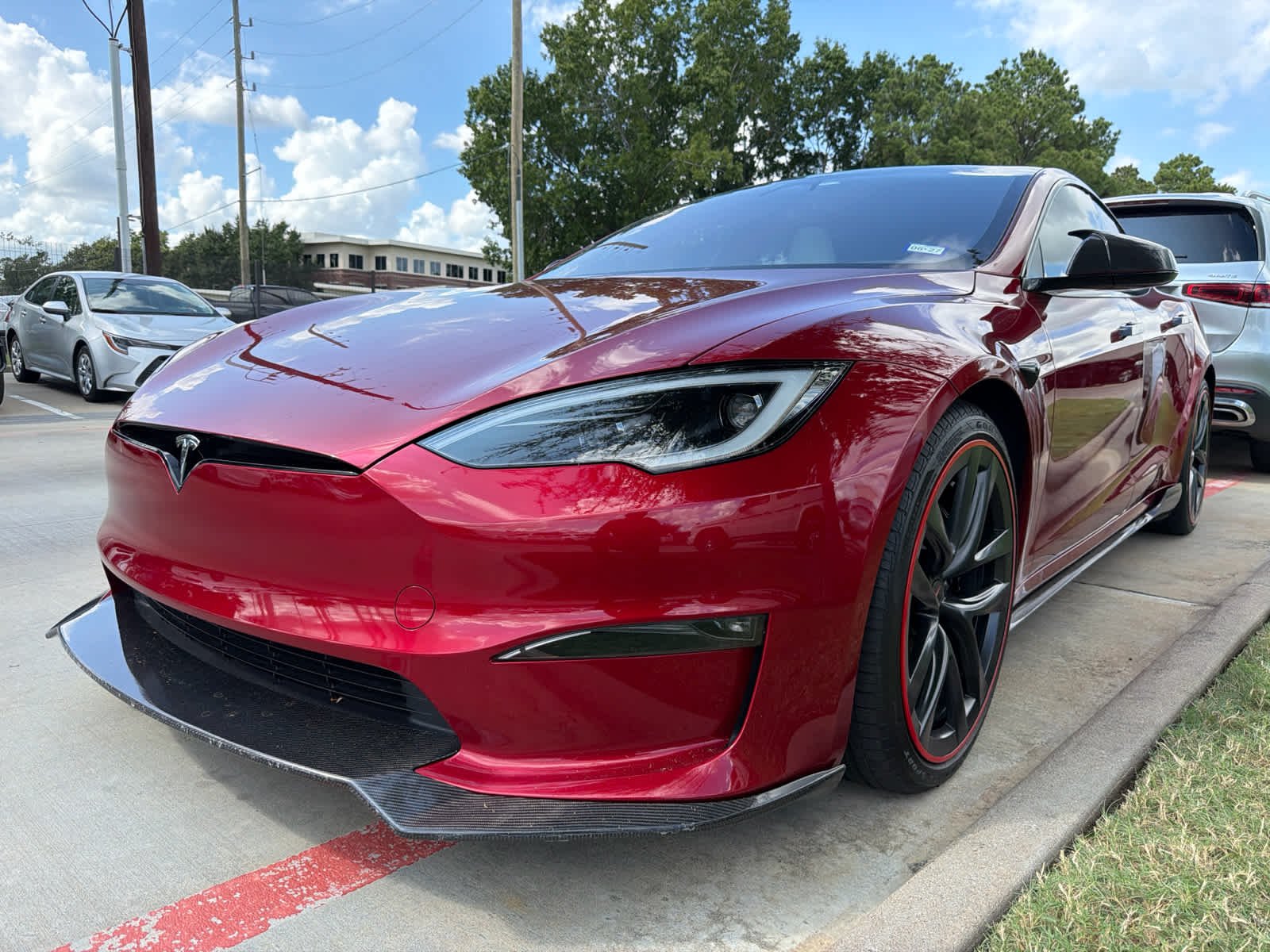 Used 2023 Red Multi-Coat Tesla  image 4