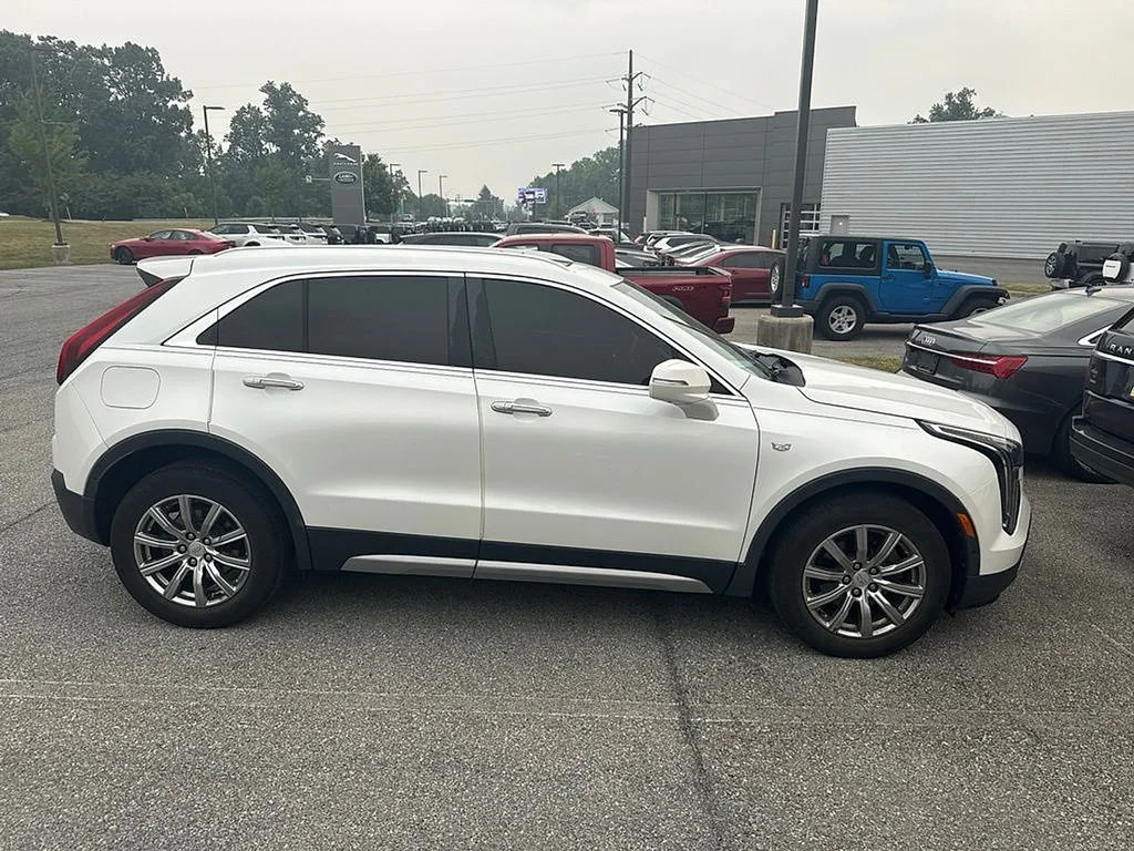 Used 2019 Crystal White Cadillac Premium Luxury image 4