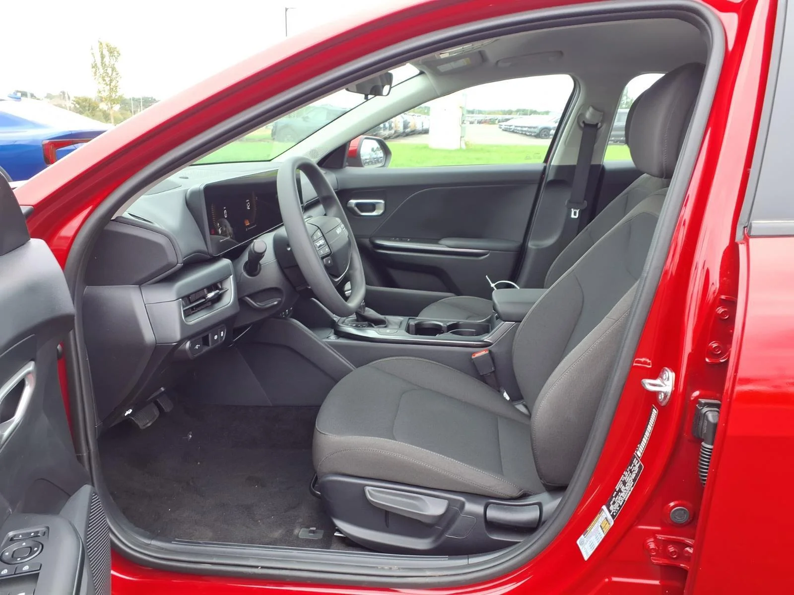 New 2026 Currant Red Kia LXS image 12