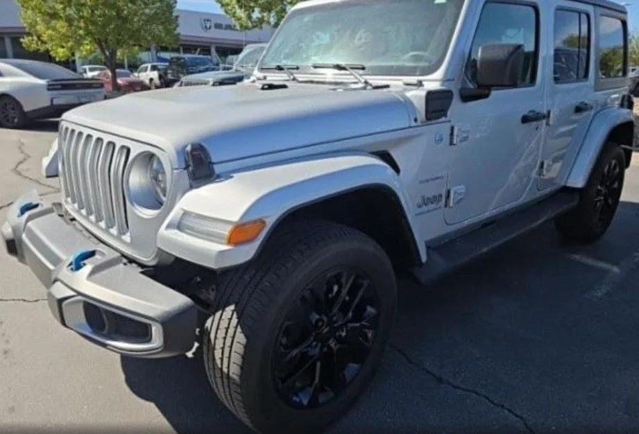 Used 2023 Silver Jeep Sahara 4xe image 1